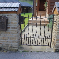 Hand-forged mailbox with a forged vintage gate