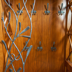 Wrought iron hangers - artistic furniture to the front
