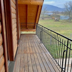 Balcony railing made in UKOVMI for a log house - external railing