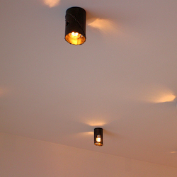 Modern ceiling lights in forged style - lighting of a family house interior