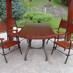 Wrought iron table and chairs - a garden furniture