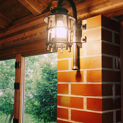 A hand forged lamp in the summer kitchen