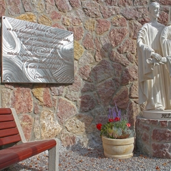 Stainless steel plaque with an inscription made for Butkov, the youngest pilgrimage place in Slovakia