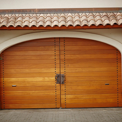 A gate with wrought iron accessories