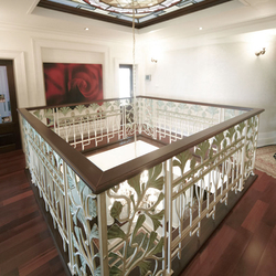 Extraordinary wrought iron railing in interior of a family house in historical style