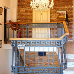 Antique railings at a guesthouse entrance produced by Ukovmi company