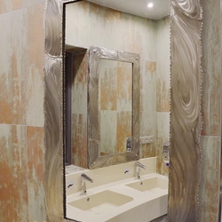 A modern stainless steel mirror - luxury mirror in the bathroom