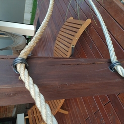 Forged rope brackets made by UKOVMI on a terrace railing