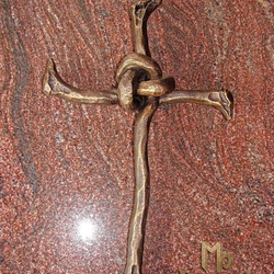 A hand wrought iron cross