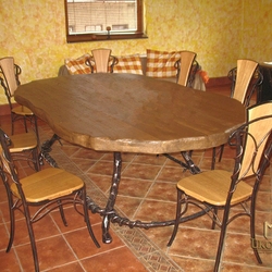 Exclusive wrought iron a table, chairs and a bench for the more demanding customer