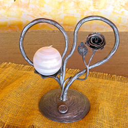 A wrought iron candleholder from love