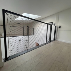 Metal railing with stainless steel mesh