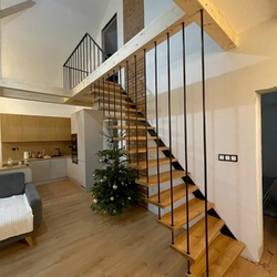 Metal railing with a simple design in the interior of a family house