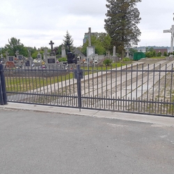 A fencing of the cemetery in ubotice - wrought iron gate and fence