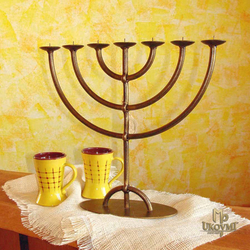 Forged Menorah candleholder with an oval base – religious candleholders