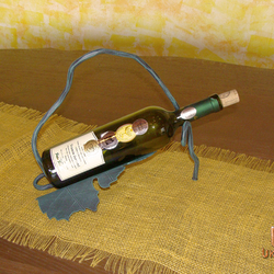 A wrought iron bottle holder