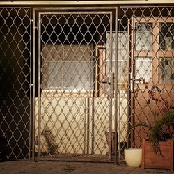 A wrought iron grille - basement entrance