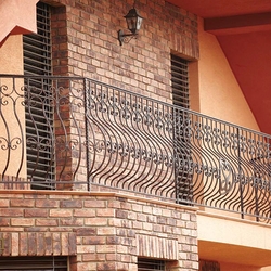 A wrought iron railing - balcony