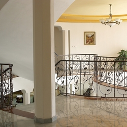 Luxury villa with interior staircase railing made by UKOVMI
