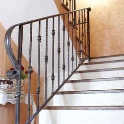 Forged interior railing with a simple design - stair railings